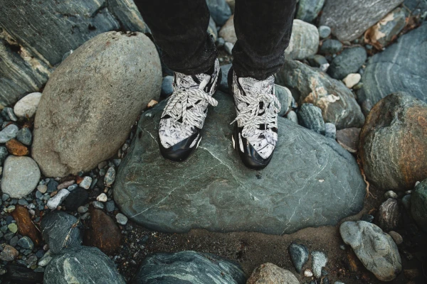 man walking on rocks